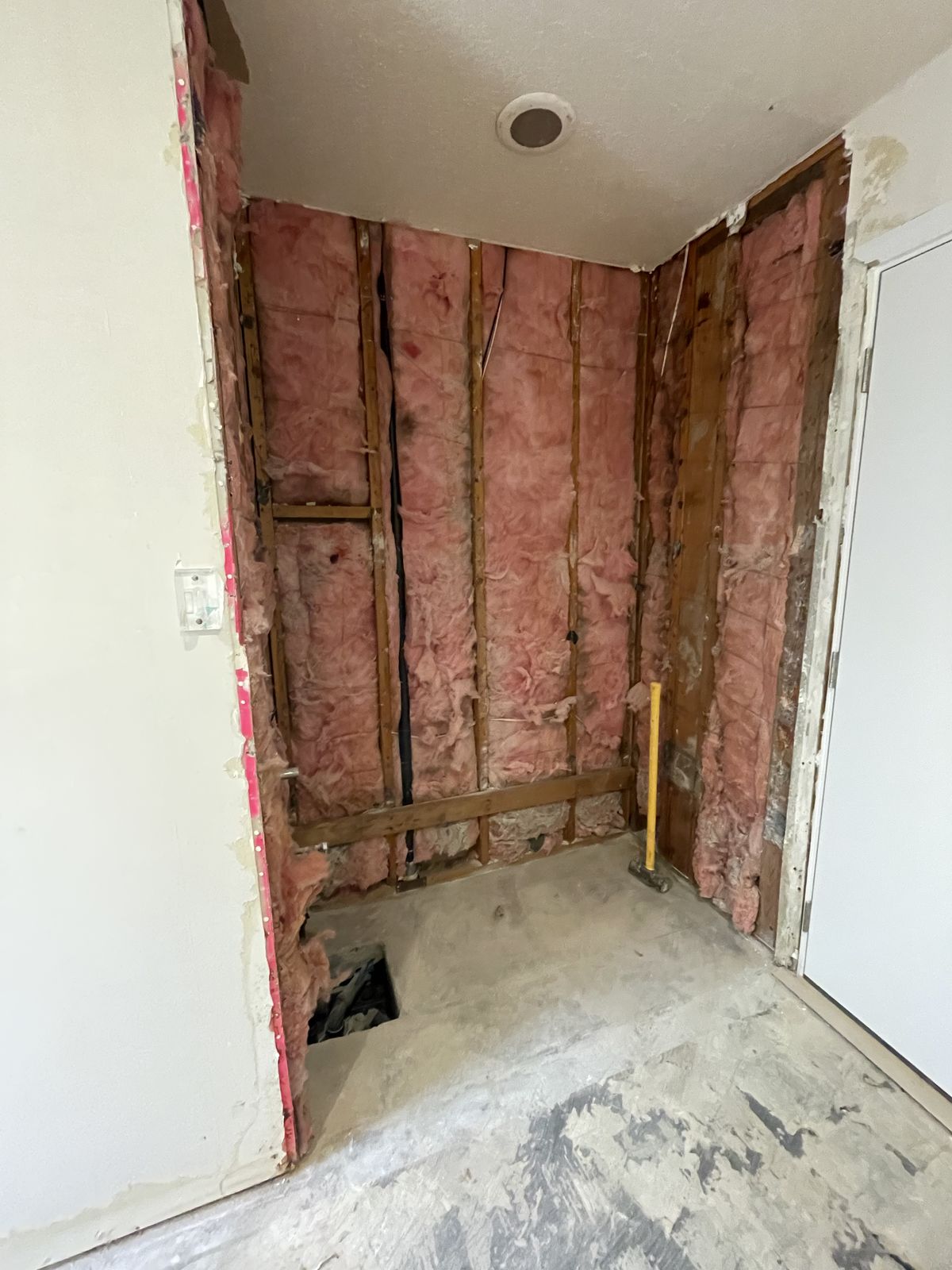 Interior wall stripped to the studs ready for remodel