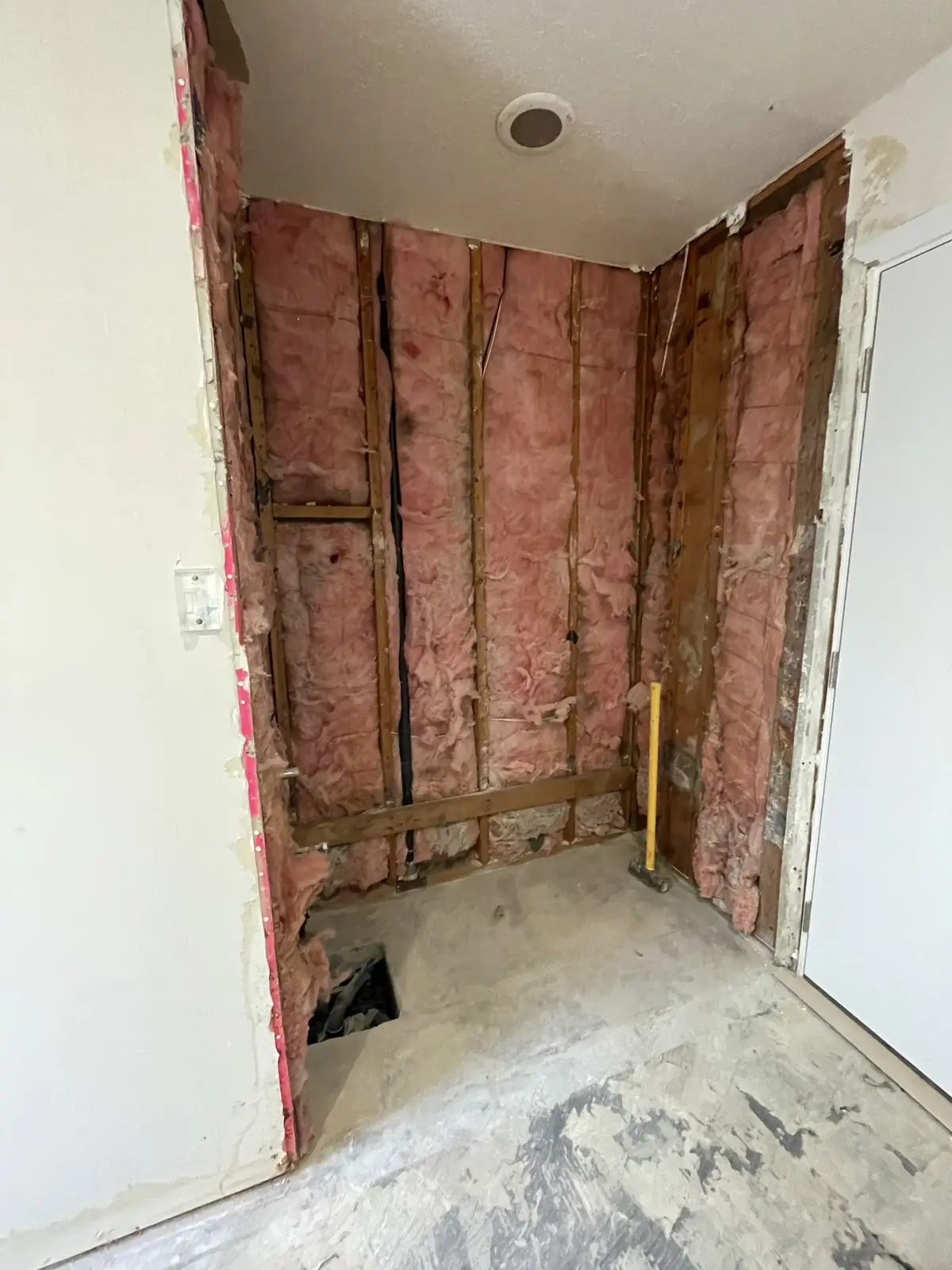 Interior wall stripped to the studs ready for remodel