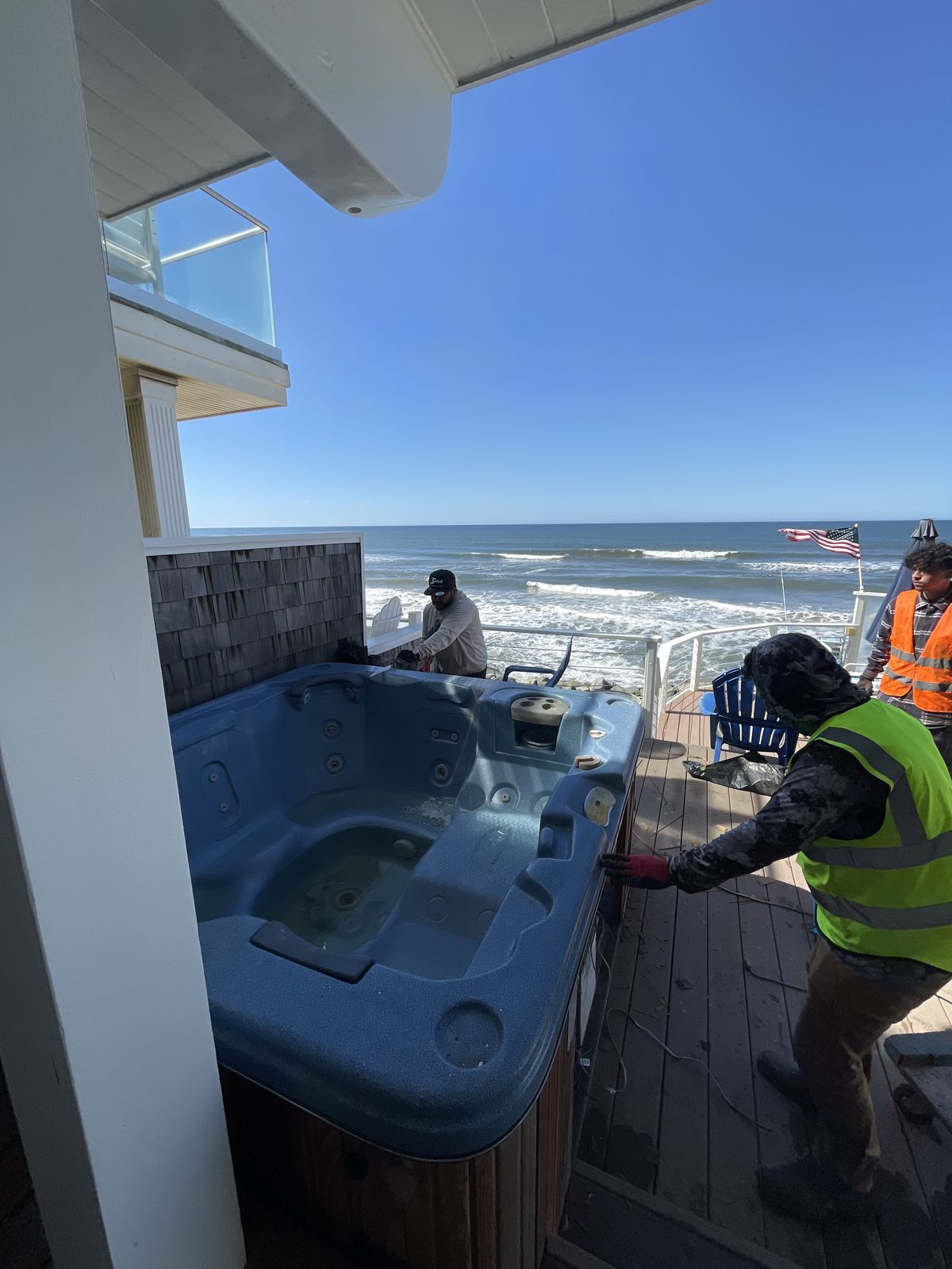 Hot tub tipped for junk removal haul off